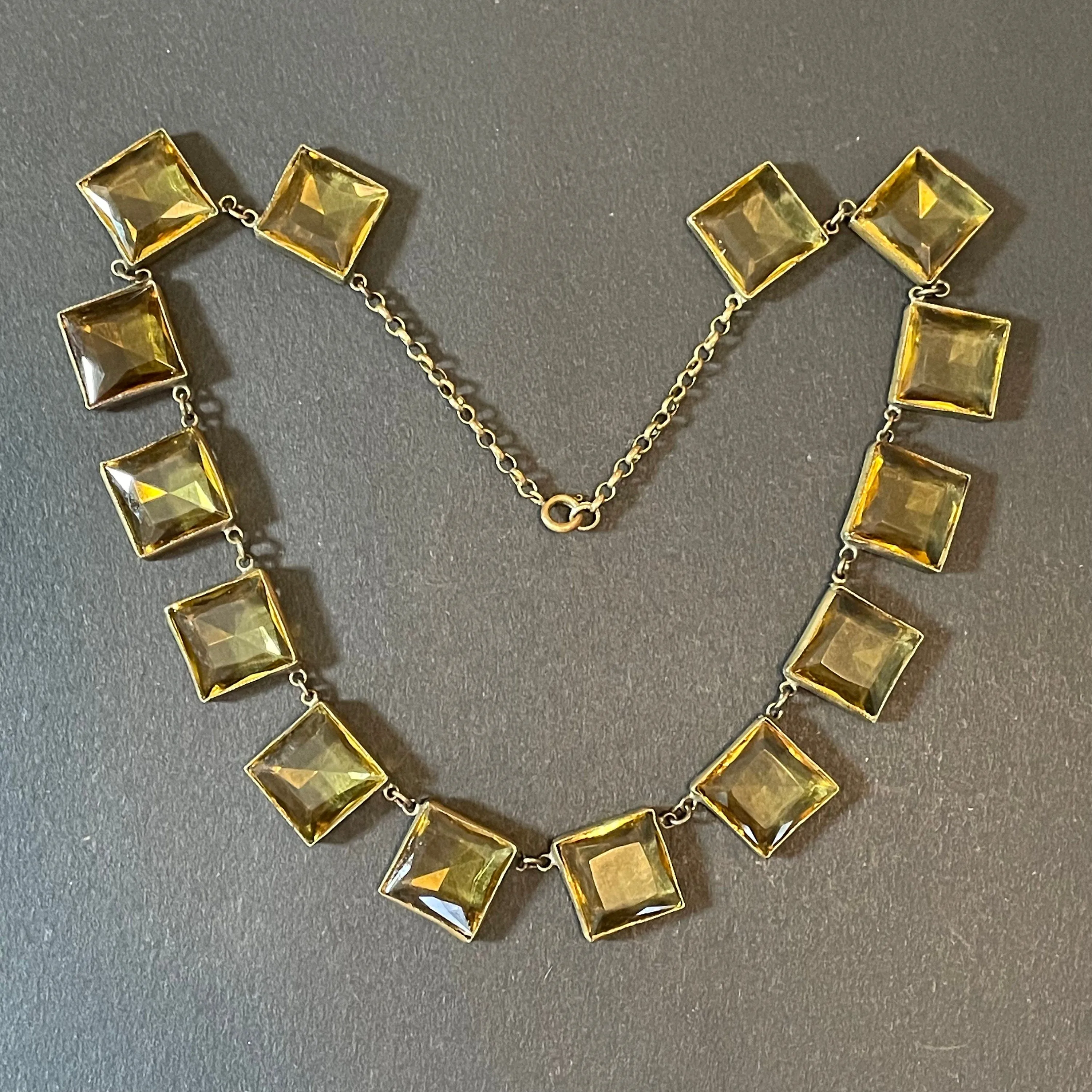 Antique late 19th century citrine yellow / orange crystal riviere necklace, huge bezel set open backed princess cut square rhinestones