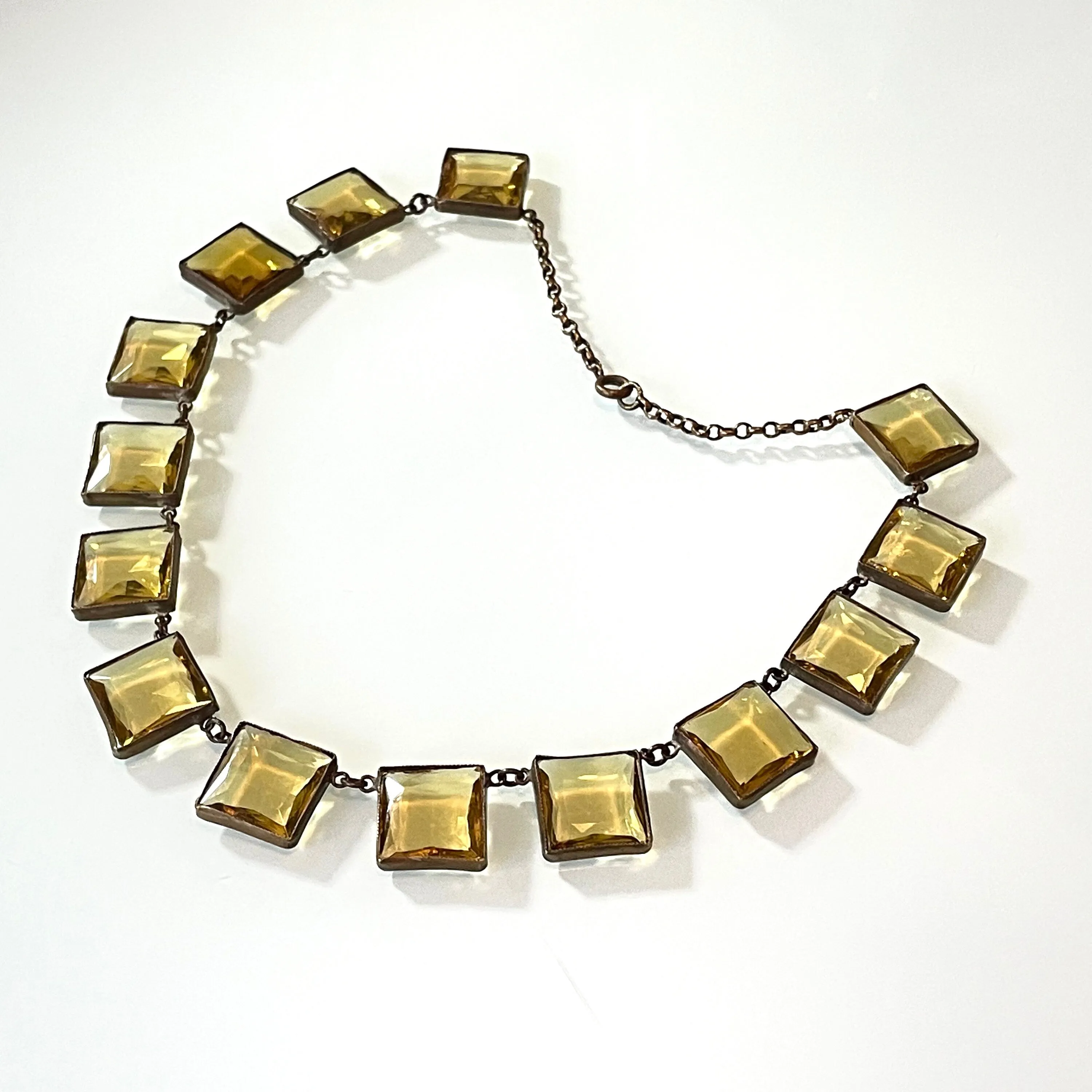 Antique late 19th century citrine yellow / orange crystal riviere necklace, huge bezel set open backed princess cut square rhinestones