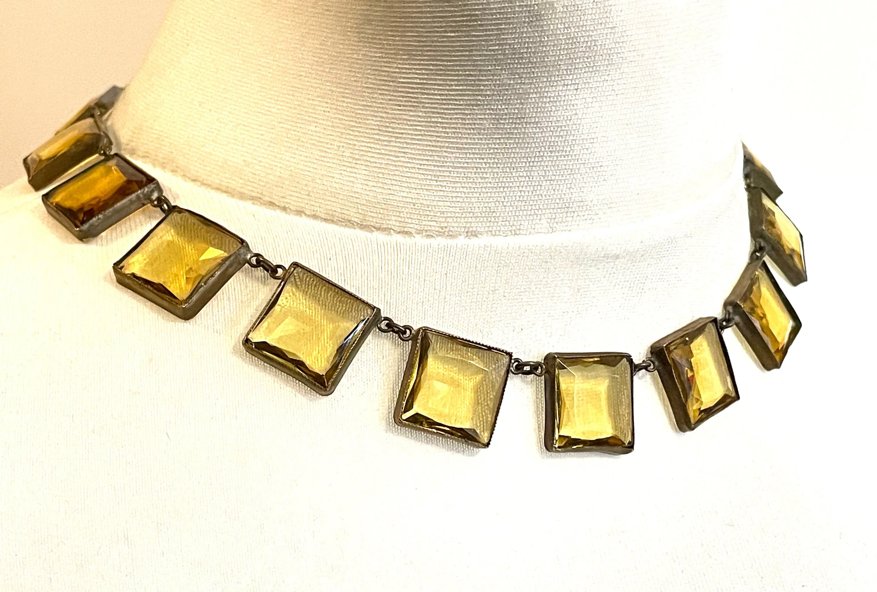 Antique late 19th century citrine yellow / orange crystal riviere necklace, huge bezel set open backed princess cut square rhinestones