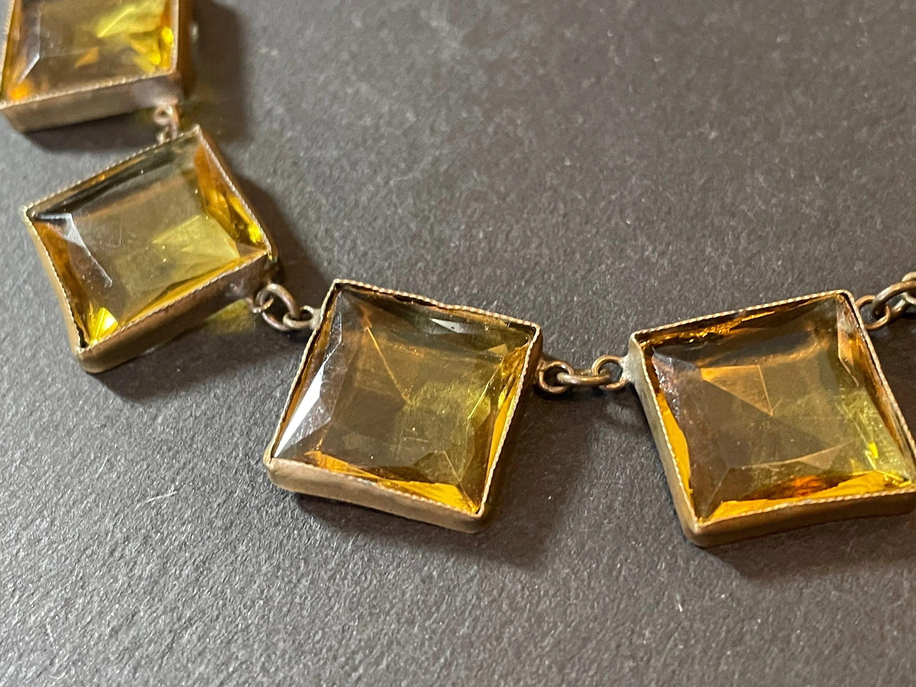 Antique late 19th century citrine yellow / orange crystal riviere necklace, huge bezel set open backed princess cut square rhinestones