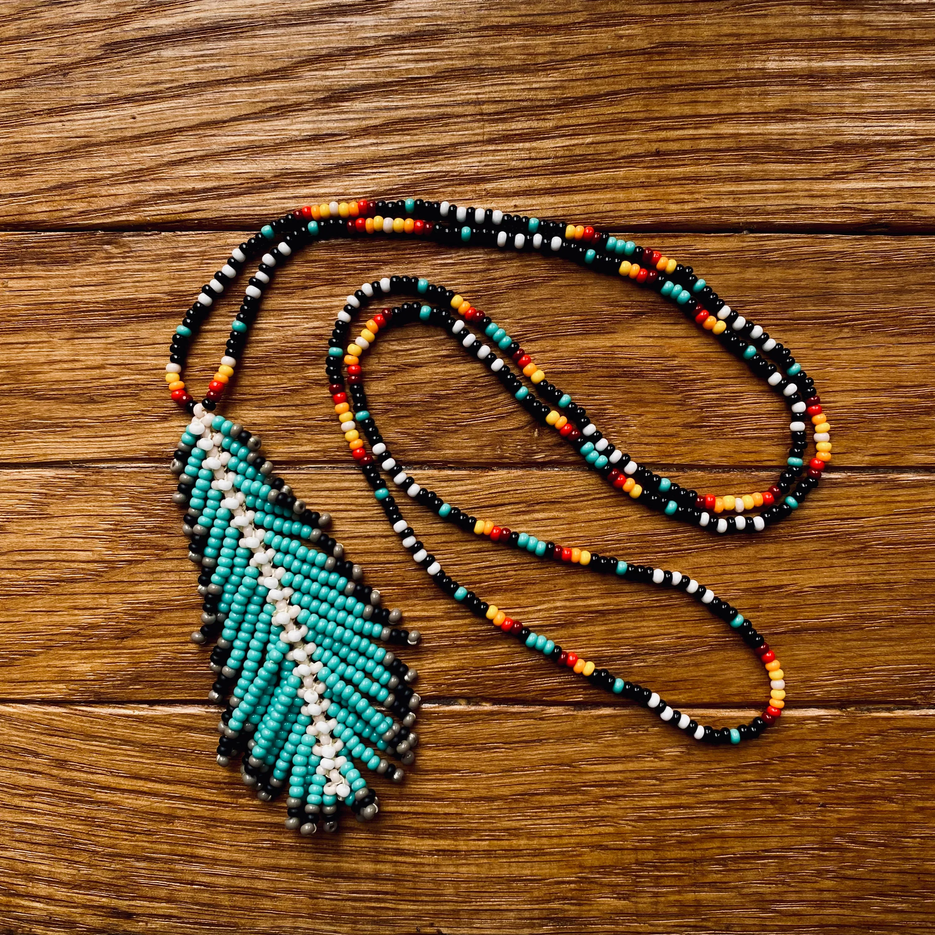 Feather Pendant seed bead Indigenous Necklace