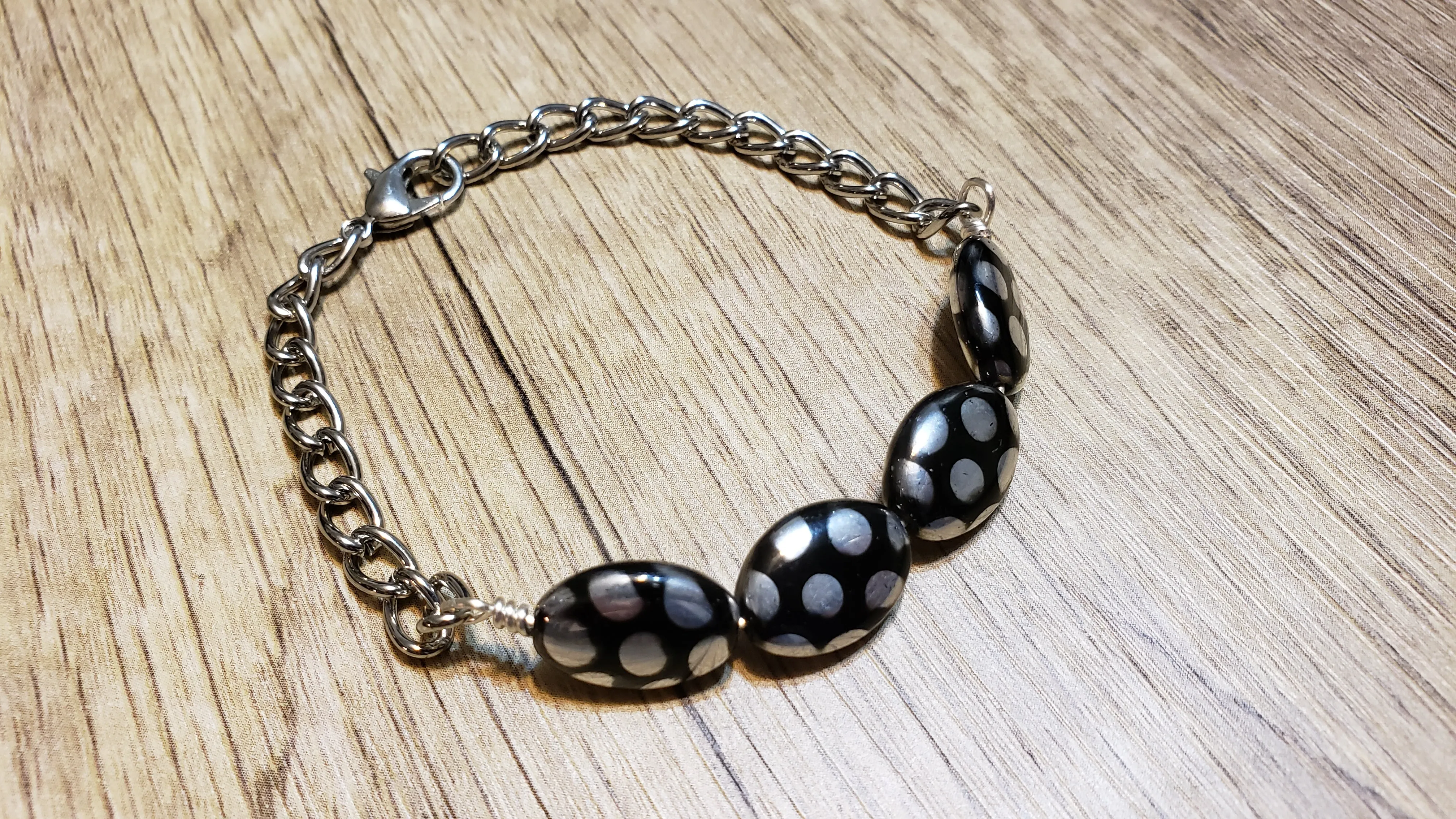 Hand Crafted Black Oval Glass & Silver Chain Bracelet. Adjustable to 8" with Lobster Claw Clasp