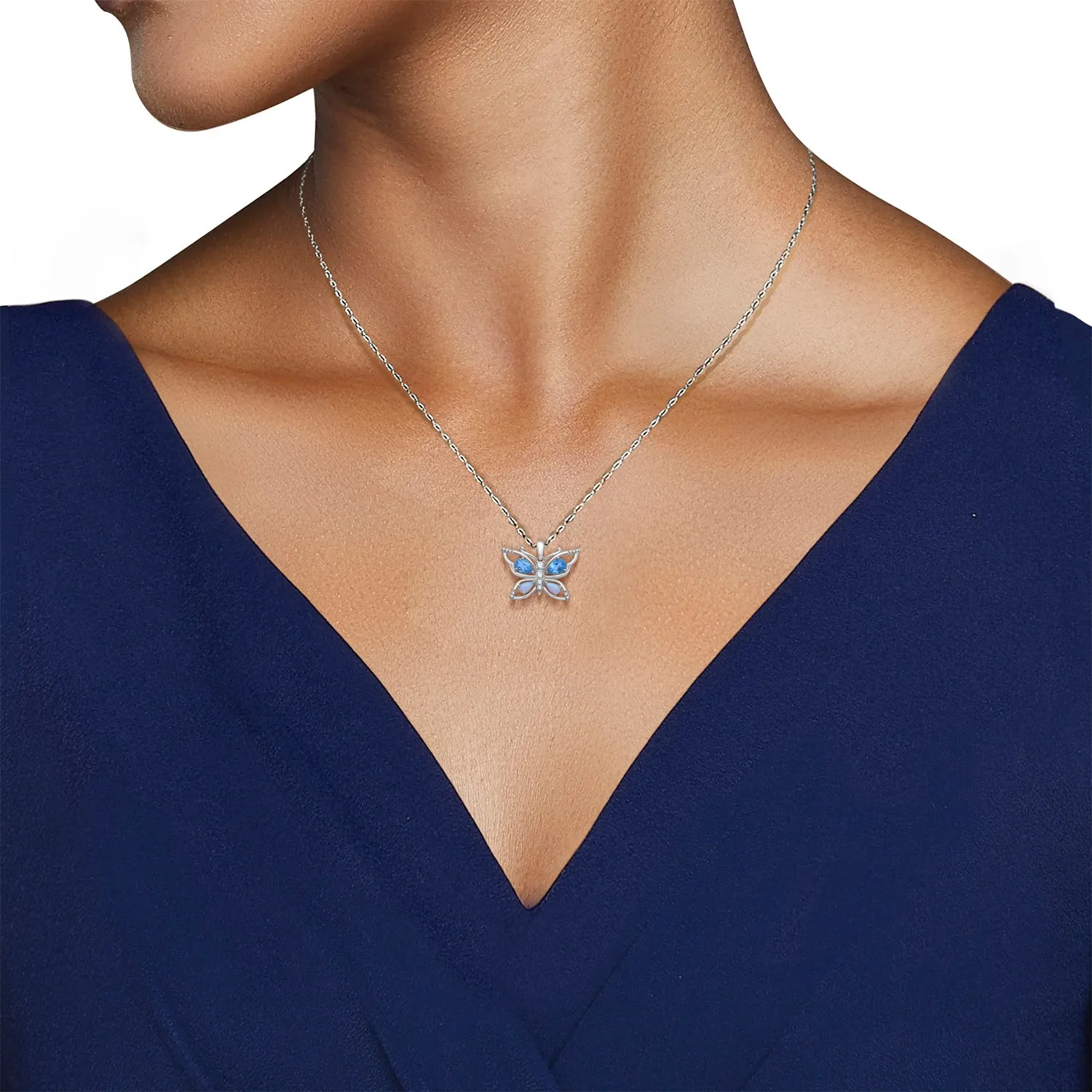 Jewelili Sterling Silver Created Opal With Swiss Blue Topaz and Diamonds Butterfly Pendant Necklace