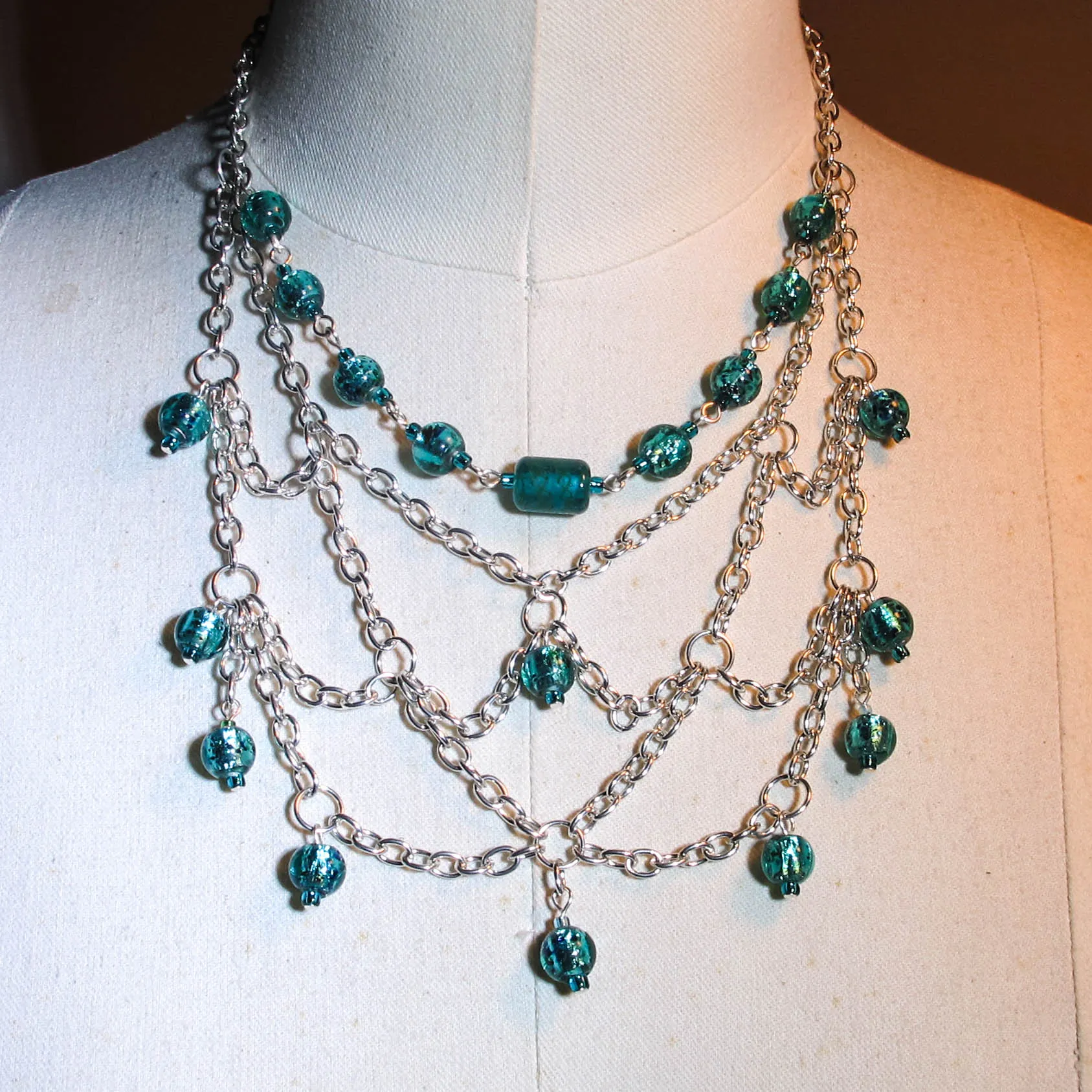 Multi-Strand, Cascading, Teal Beaded Necklace with Netted Silver Chain