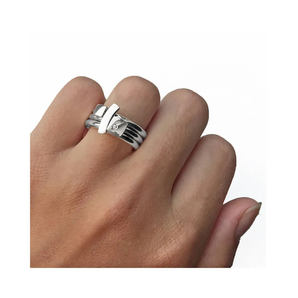 Polished silver ring with diamond and silver detail