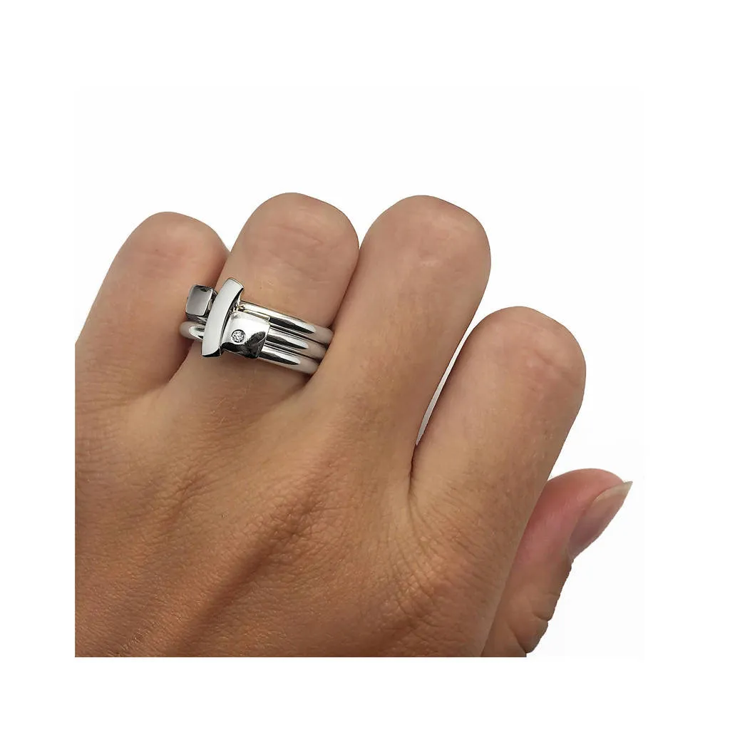 Polished silver ring with diamond and silver detail