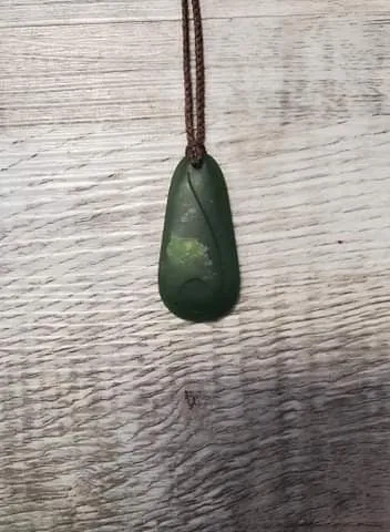 Short Wide Jade Teardrop with Shallow Carving- made in Jade City