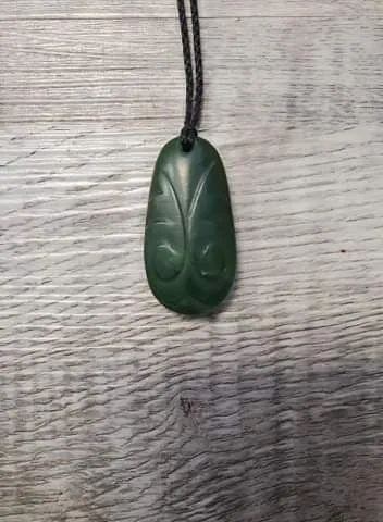 Short Wide Jade Teardrop with Shallow Carving- made in Jade City