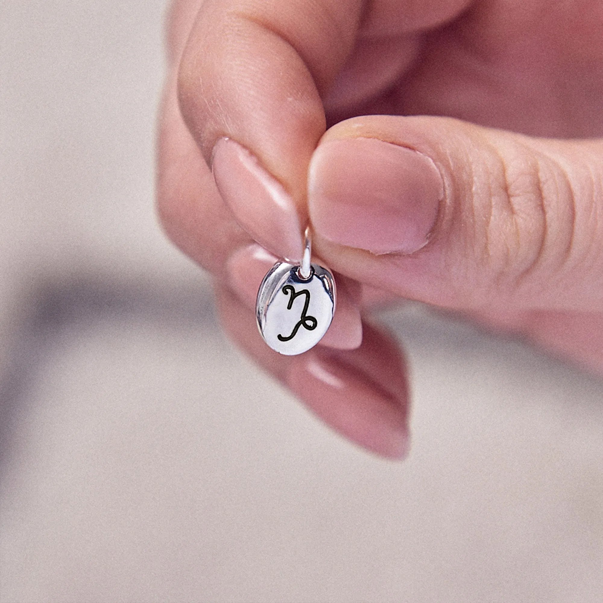 Zodiac Pebble Silver Charm